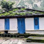 Houses with Pathal roofs built in the hilly style in Uttarakhand