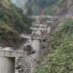 roads in uttarakhand through river